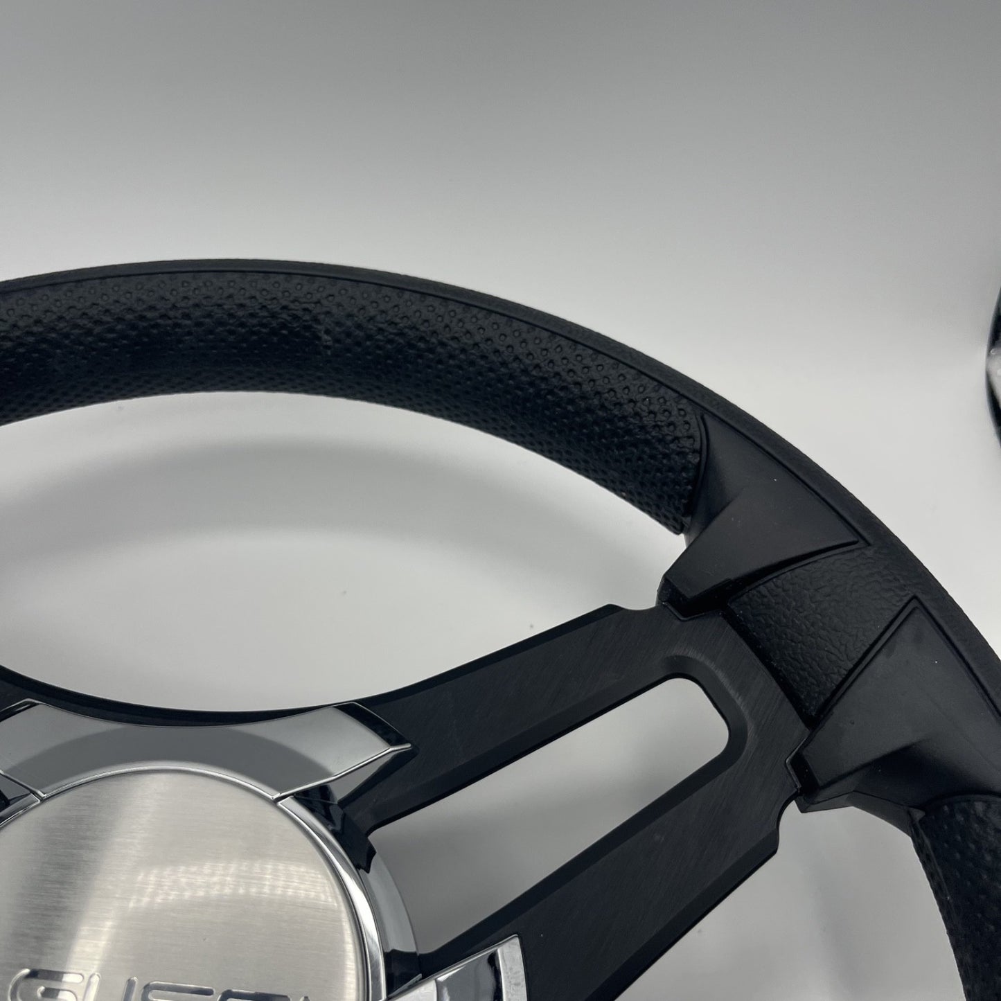 Gussi Italia Marine Steering Wheel Black Brush Metal Spokes | Gussi Logo