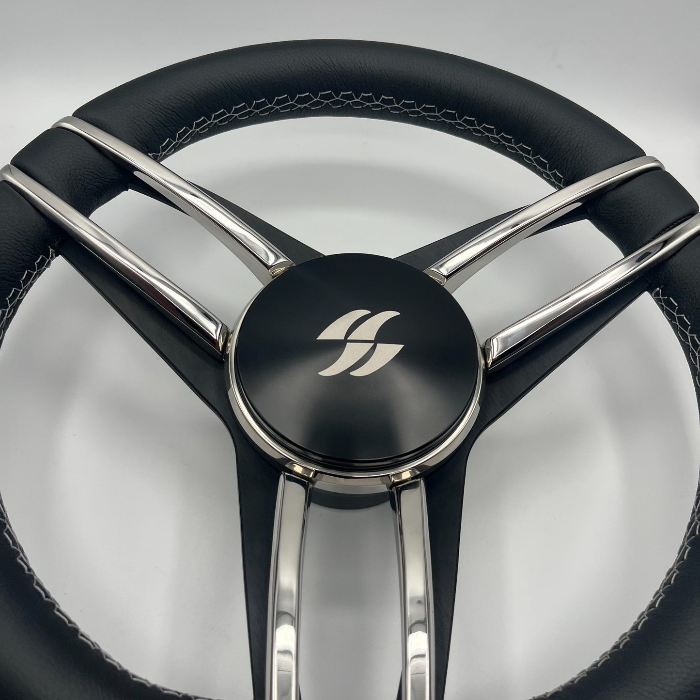 Varatti Boat Steering Wheel Stainless Steel Spoke Leather Rim | Varatti Logo