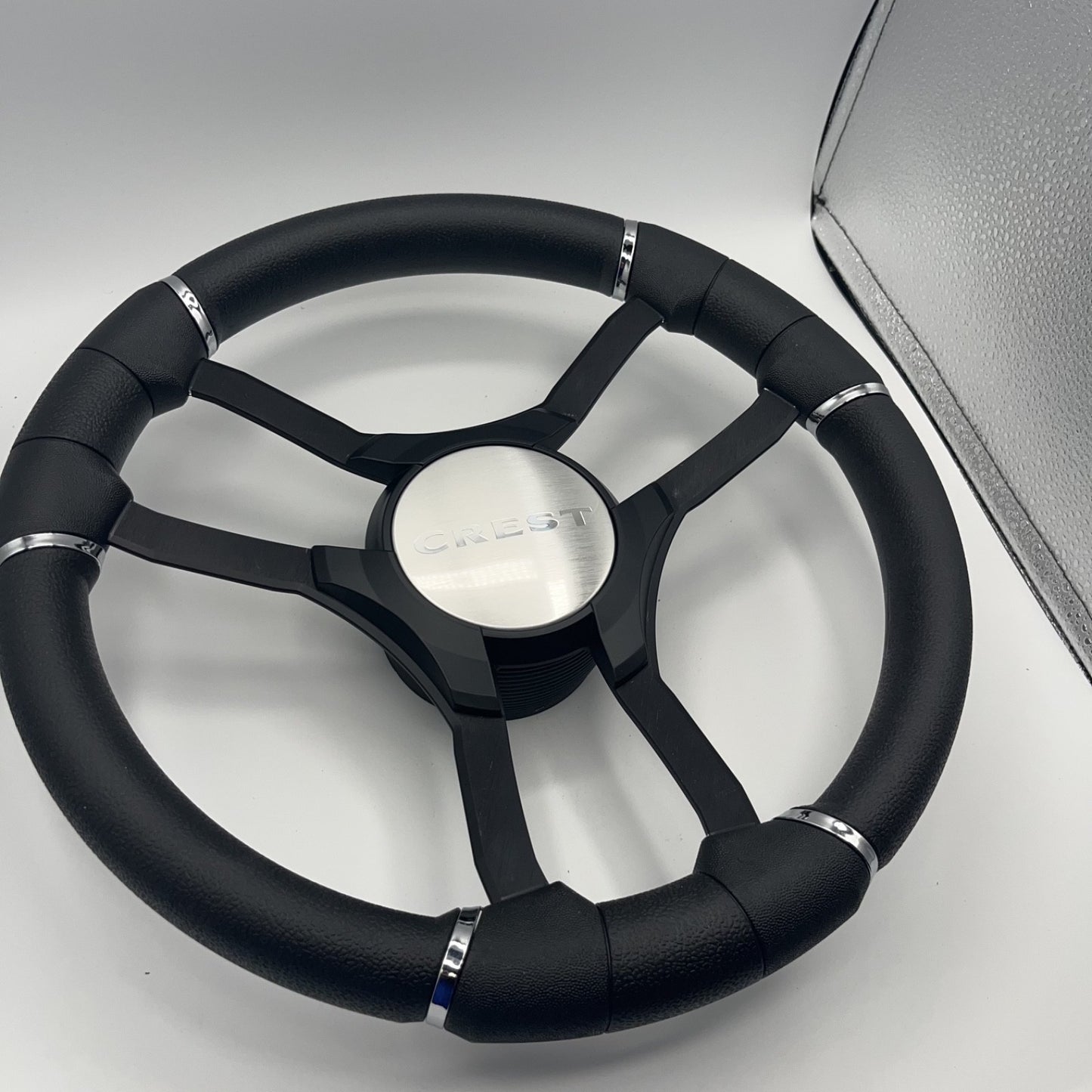Malera Boat Steering Wheel Black Aluminum Spokes | Black Crest Boats Logo
