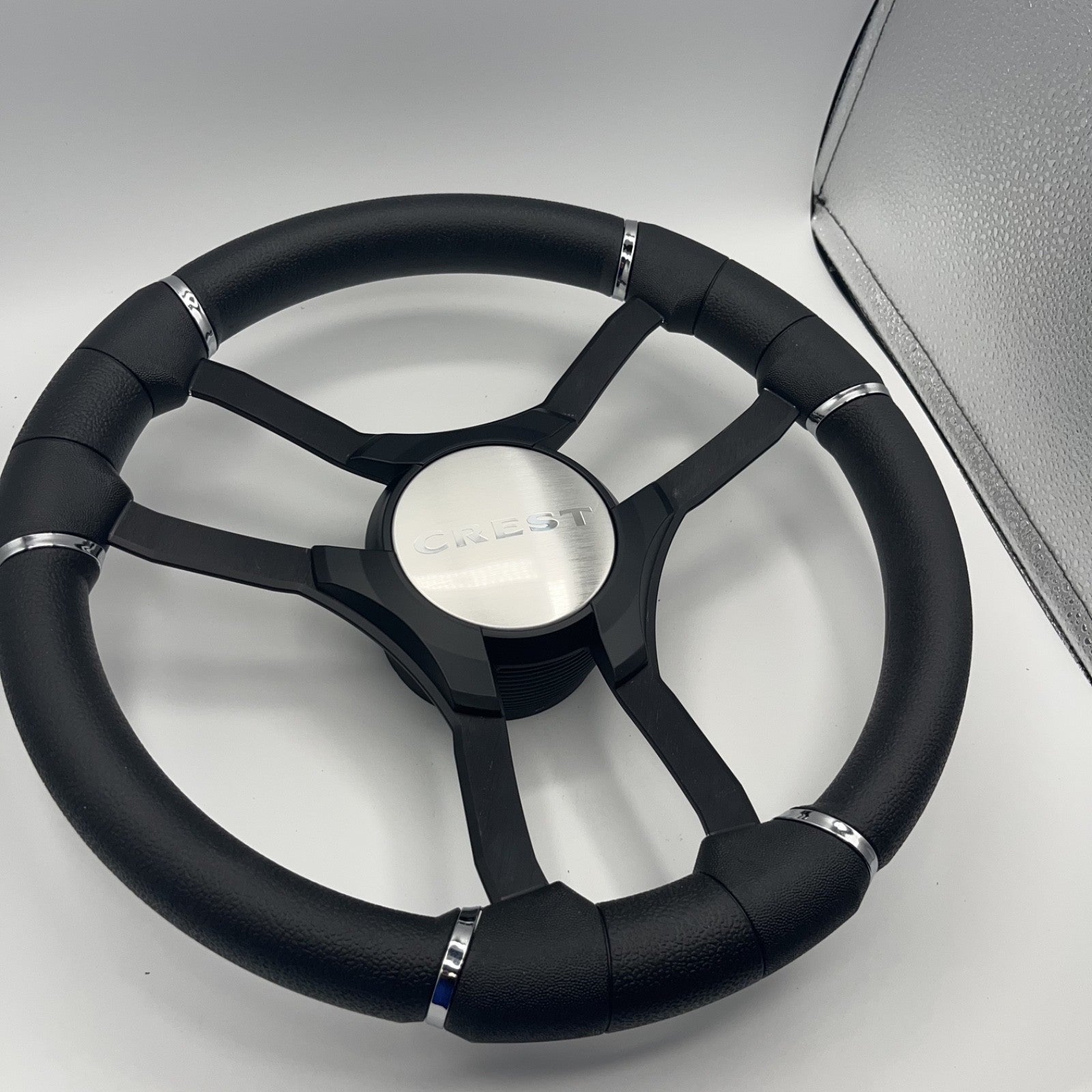 Malera Boat Steering Wheel Black Aluminum Spokes | Black Crest Boats Logo