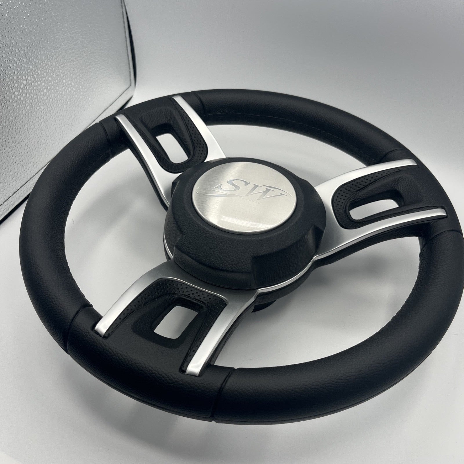 Gussi Italia Black Model 702 Steering Wheel with Keyed Hub | Blue Wave Cap