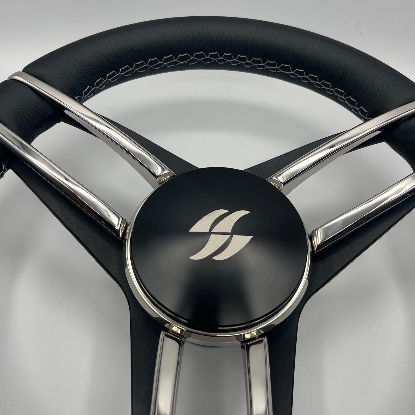 Varatti Boat Steering Wheel Stainless Steel Spoke Leather Rim | Varatti Logo