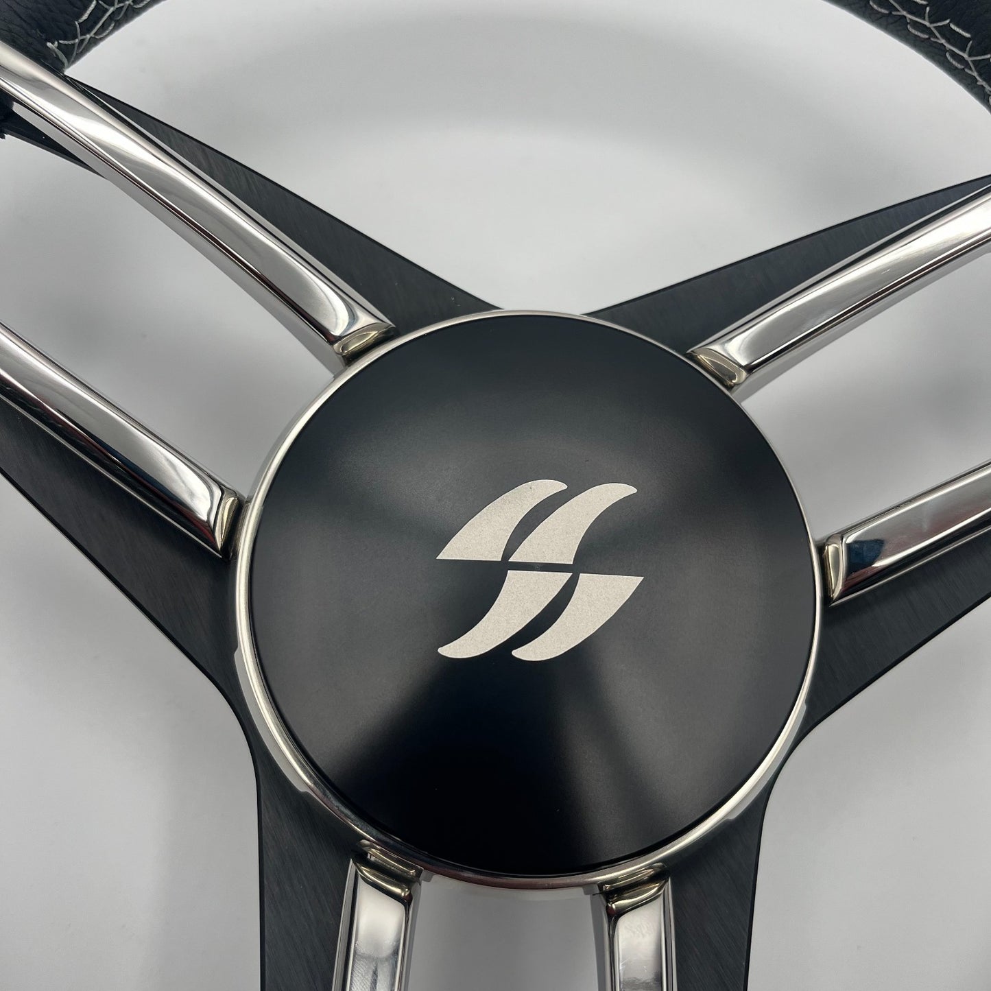 Varatti Boat Steering Wheel Stainless Steel Spoke Leather Rim | Varatti Logo