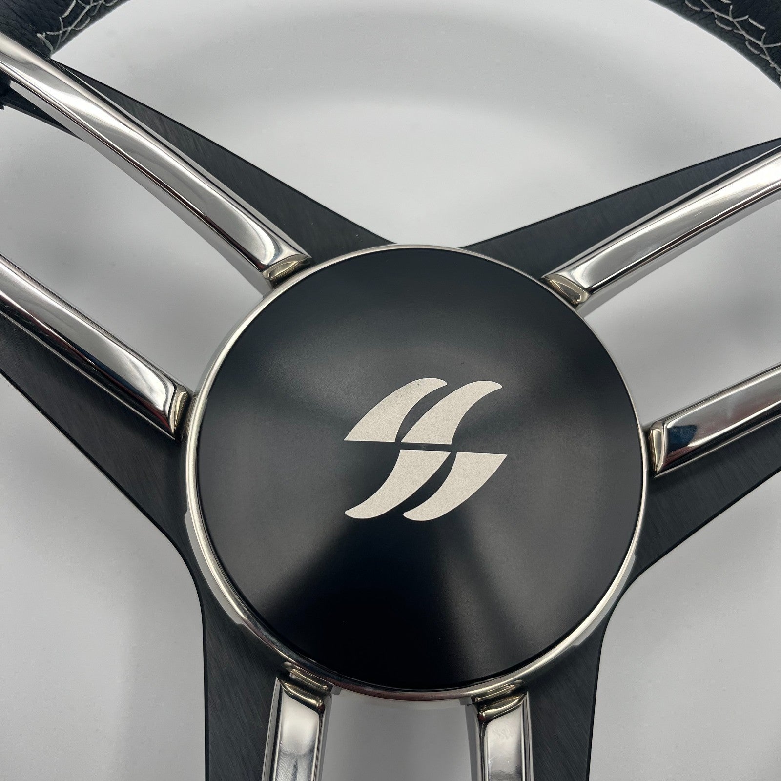 Varatti Boat Steering Wheel Stainless Steel Spoke Leather Rim | Varatti Logo