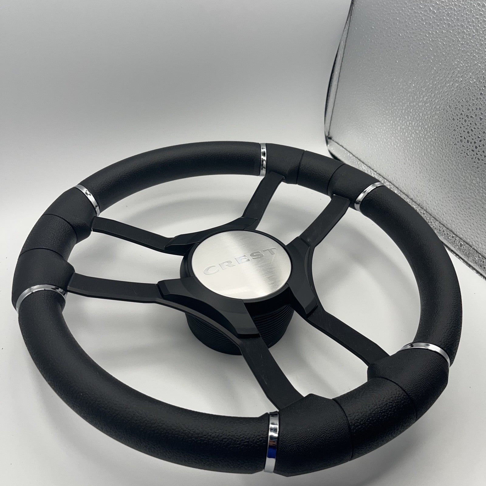 Malera Boat Steering Wheel Black Aluminum Spokes | Black Crest Boats Logo