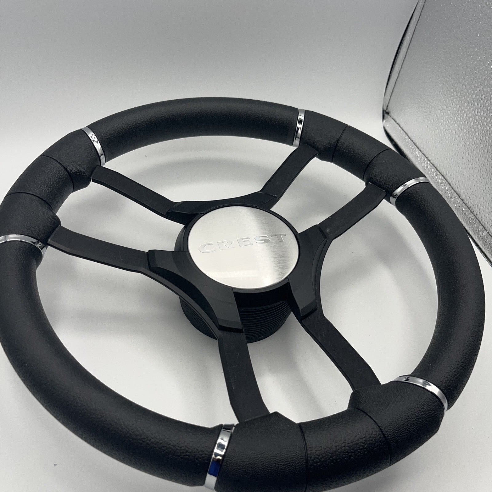 Malera Boat Steering Wheel Black Aluminum Spokes | Black Crest Boats Logo
